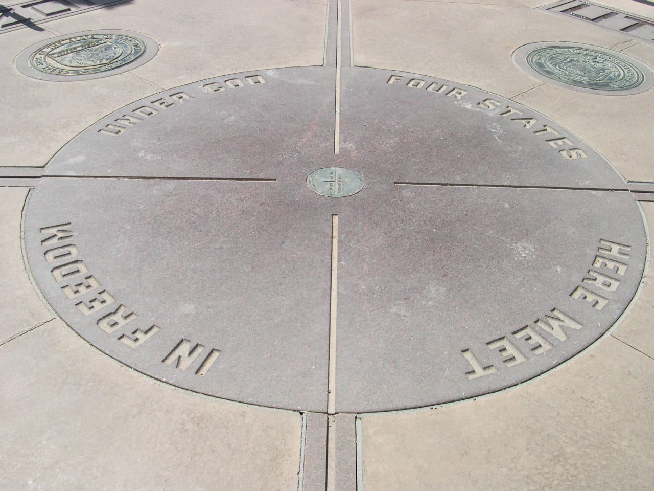 Four Corners Monument where NM, CO, AZ, and UT meet