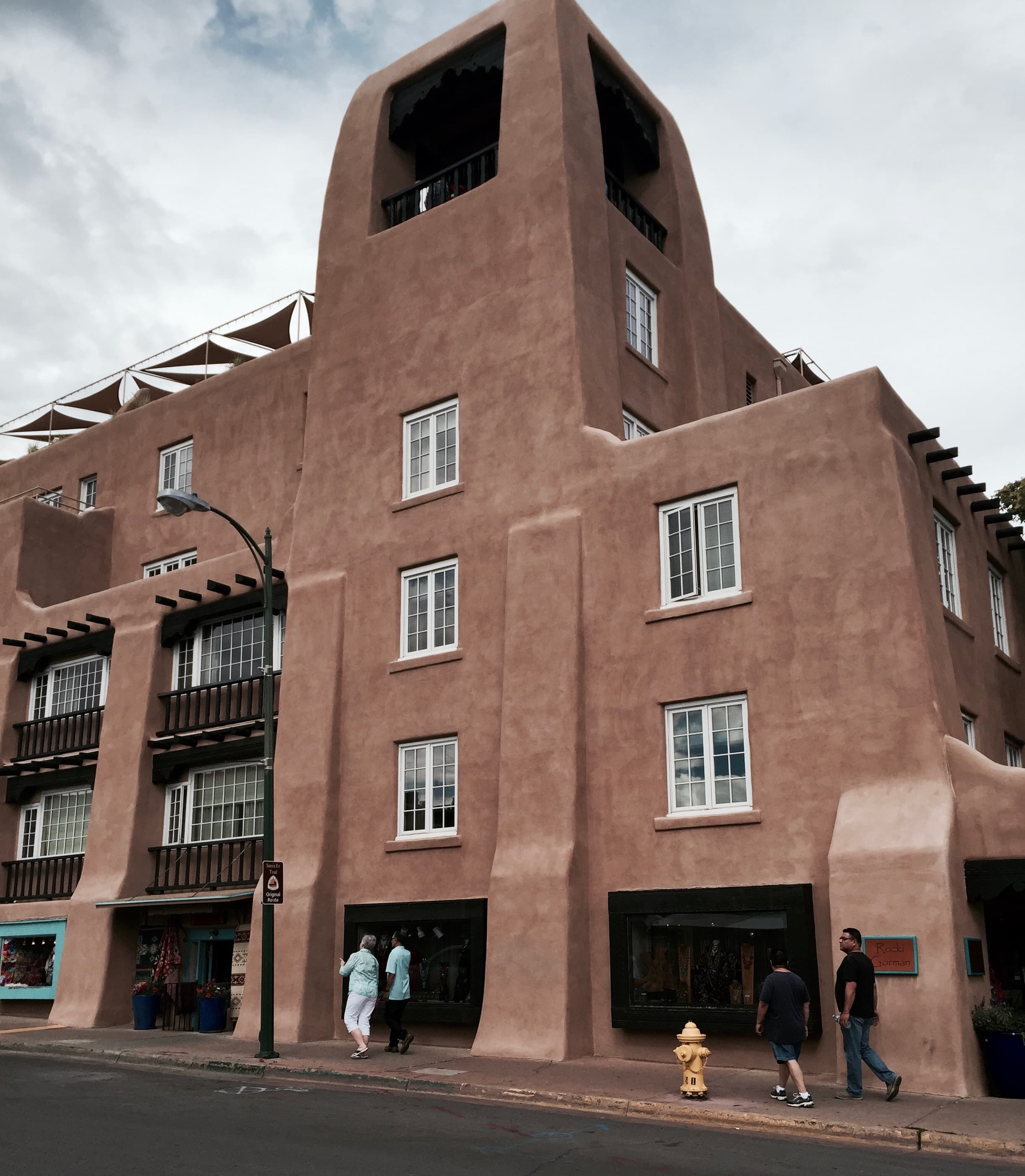 Exterior of La Fonda on the Plaza hotel in Santa Fe, New Mexico, showing Pueblo Revival architecture
