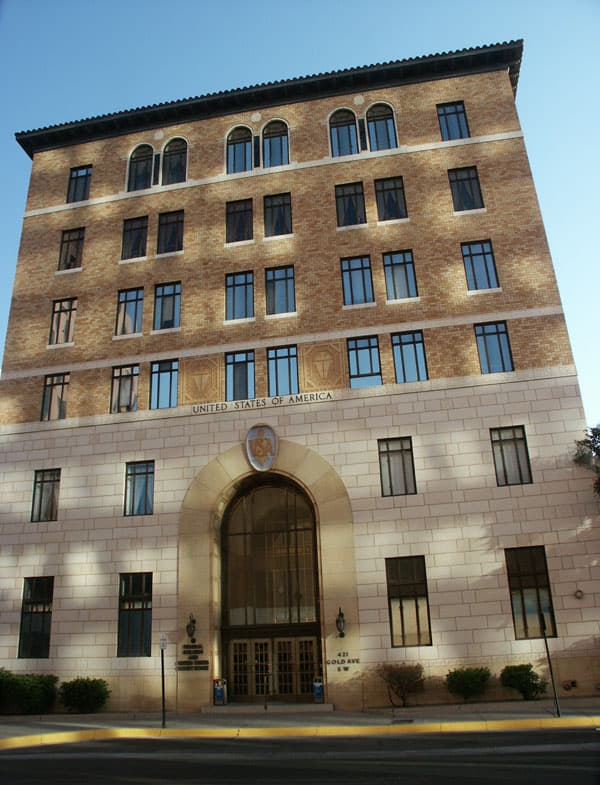 The 1930 Federal Building and U.S. Courthouse in downtown Albuquerque, New Mexico, with limestone facade and Mediterranean-style red tile roof