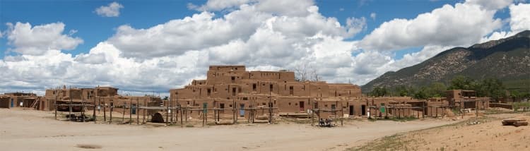 Panoramic view of the historic adobe buildings at Taos Pueblo, New Mexico